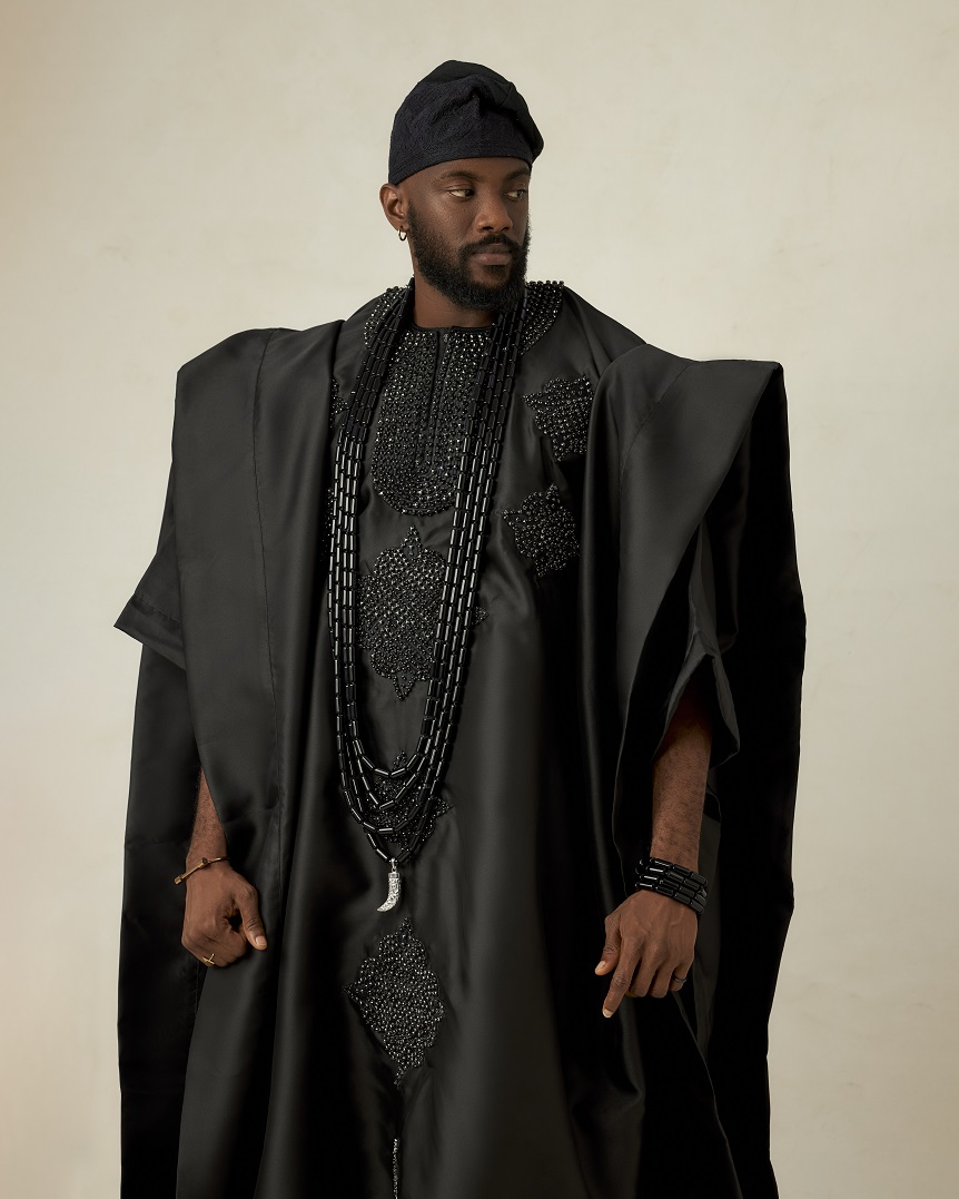Black satin agbada embellished with crystal rhinestones
